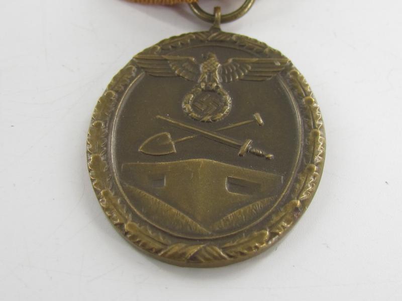 Westwall Medal with Paper Bag