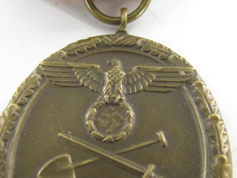 Westwall Medal with Paper Bag