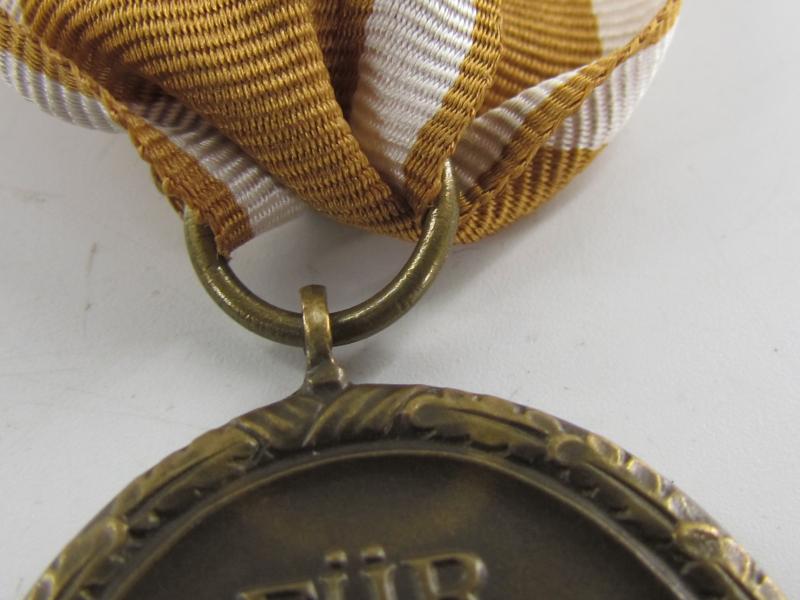 Westwall Medal with Paper Bag