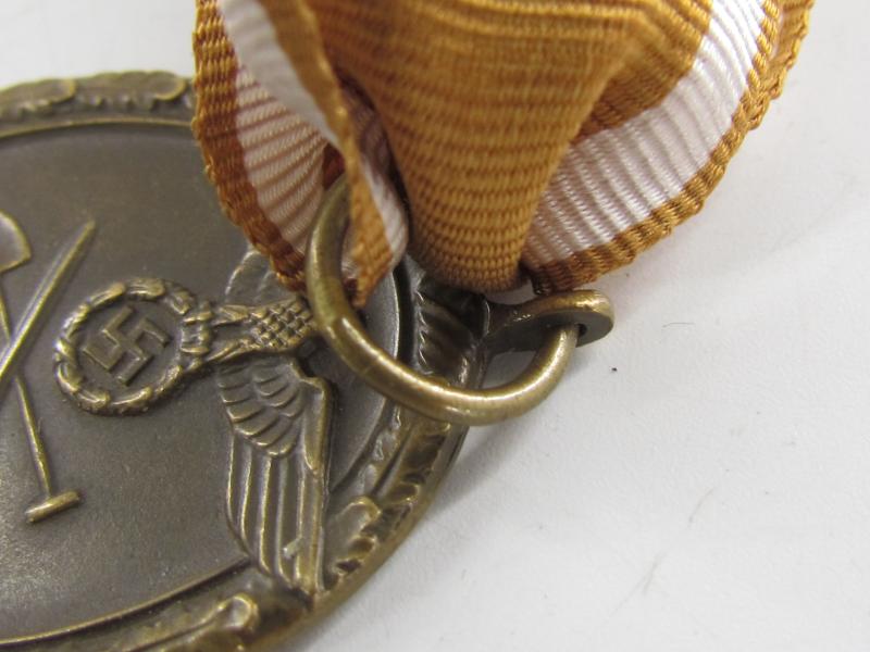 Westwall Medal with Paper Bag