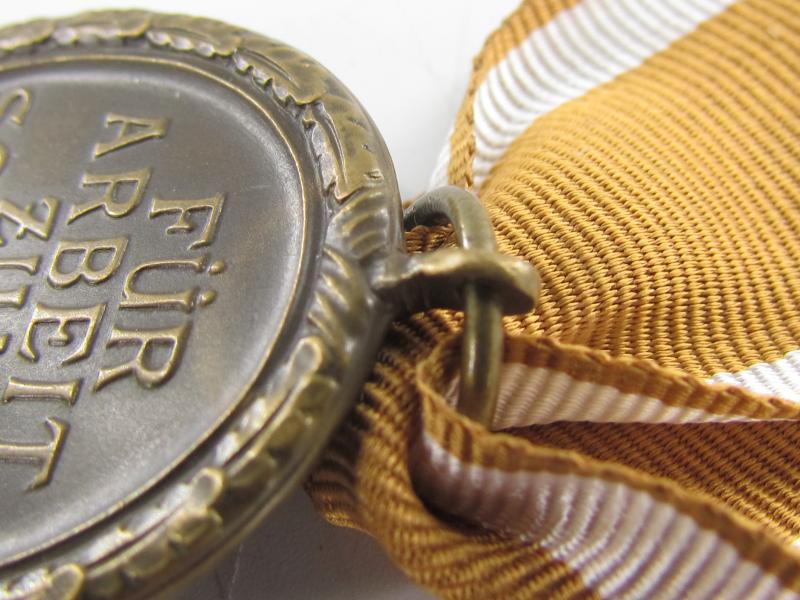 Westwall Medal with Paper Bag