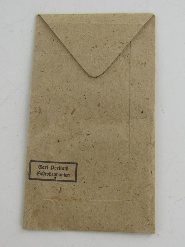 Westwall Medal with Paper Bag