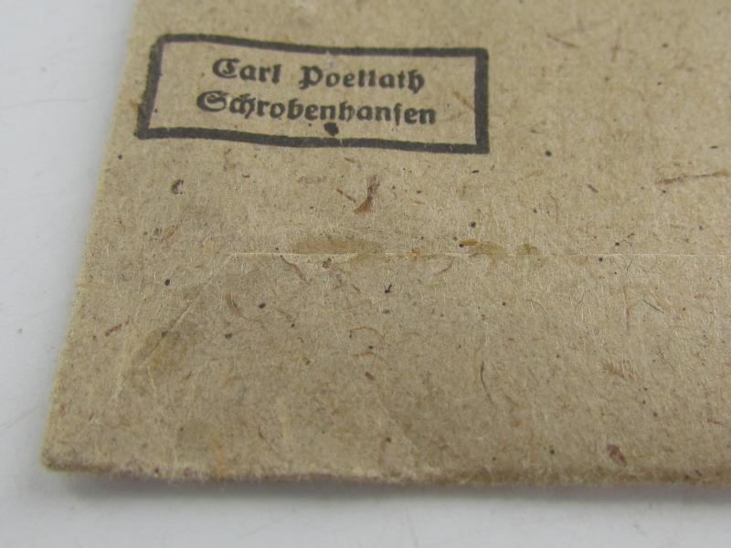 Westwall Medal with Paper Bag