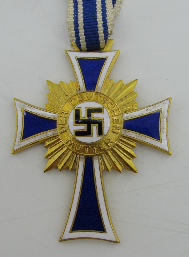 Mother’s cross in gold with box ( Klamt und Söhne )