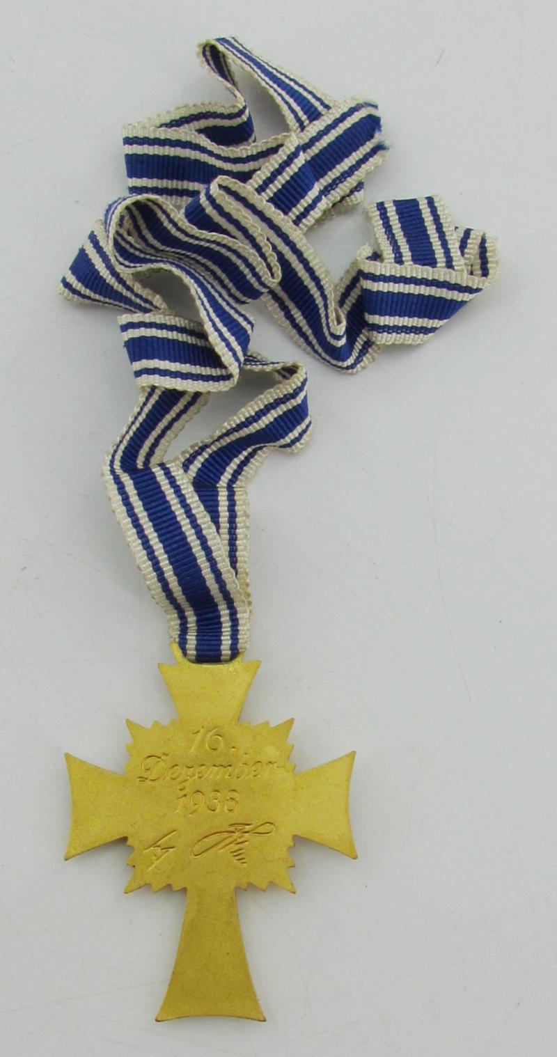 Mother’s cross in gold with box ( Klamt und Söhne )